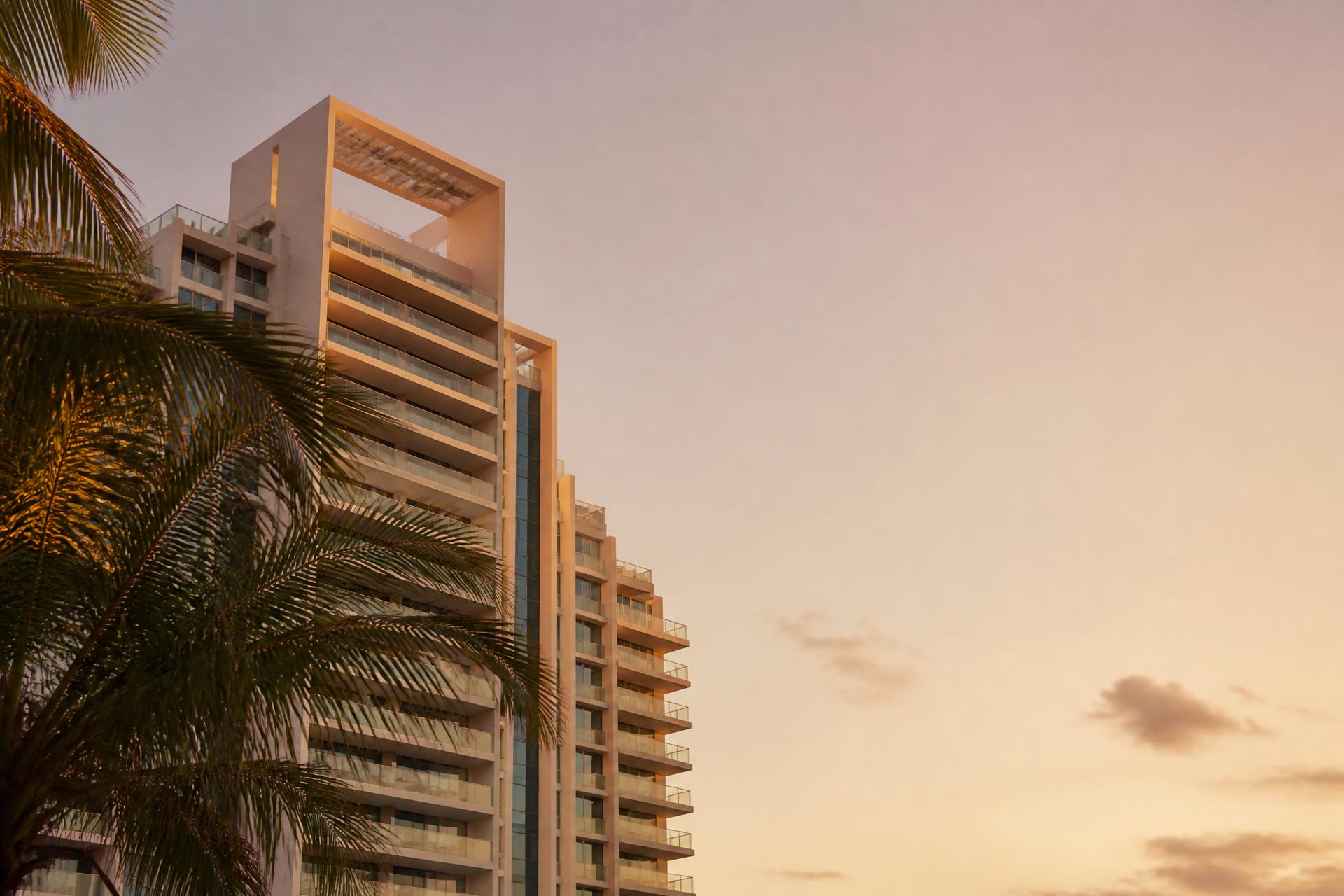 Modern Miami condominium architecture at golden hour